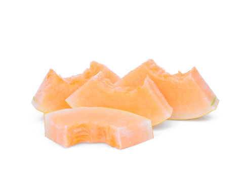 sliced yellow cantaloupe melon isolated on white background