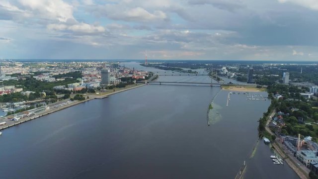 4K TV tower Riga City Bridges drone Flight Old town air flight with buildings and cars near daugava river and Library