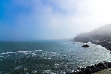waves breaking on the rocks