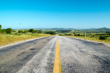 Road in the middle of rural field.