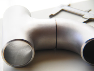 Dimensional inspection of stainless steel butt weld pipe fittings, elbow and tees with vernier...