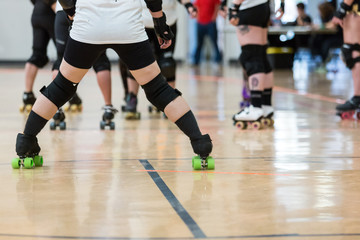 Fototapeta premium Roller derby players compete against each other