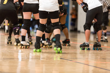 Fototapeta premium Roller derby players compete against each other
