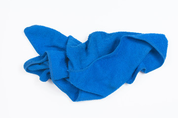 Blue folded microfiber cloth isolated on white background