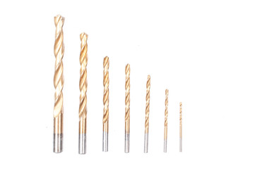 Drill bits of different sizes isolated on white background