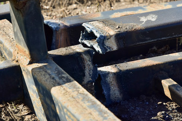 metal structures after gas cutting. melted metal on rusty profile pipes