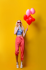 woman and balloons
