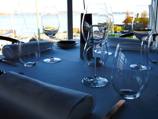 Elegant table arranged with cutlery and glassware for a dinner