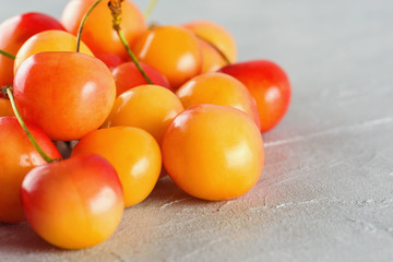 Ripe yellow-red cherry berries macro close-up.  Juicy berries, diet, healthy lifestyle.