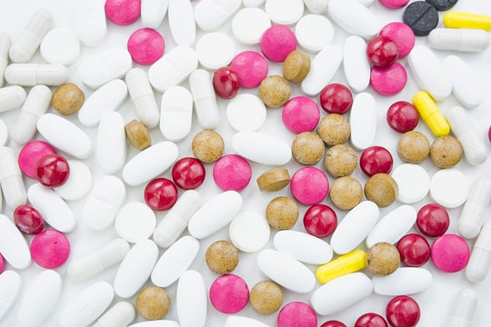 A bunch of colored tablets allopathic and Ayurvedic.Medical topic