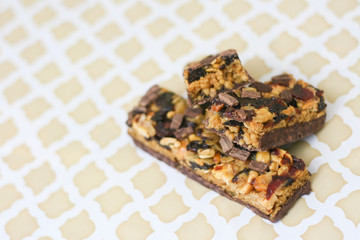 Granola bar on tan vintage pattern
