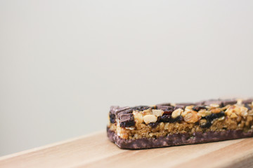 Granola bar on wood surface