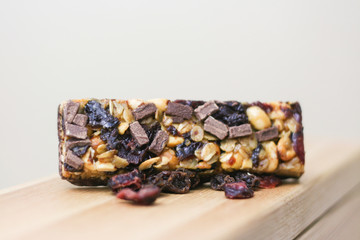 Granola bar on wood surface