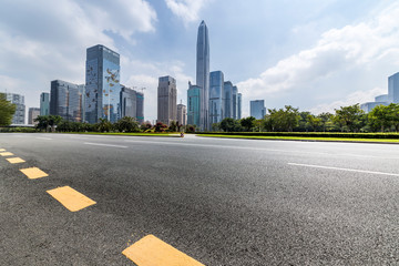 Panoramic skyline and modern business office buildings with empty road,empty concrete square floor