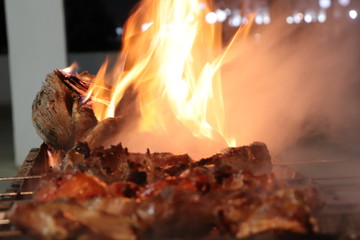 delicious barbeque on fire