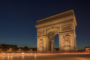 Fototapeta na wymiar Arch of Triumph on the star place square. Paris, France