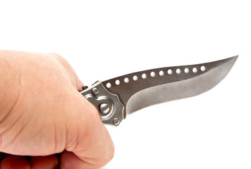 Obraz premium Knife in hand on a white background
