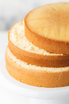 Sponge cake. Shortcakes on a white cake stand, selective focus
