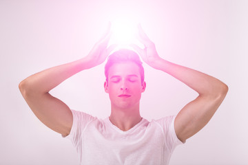Yoga man in lotus pose with chakra symbol. The 6th Chakra The Third Eye Ajna