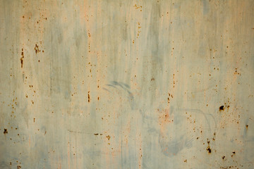 Old gray blue metallic smooth surface with rust and paint stains. rough texture