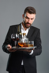 Man holding tray with beverages