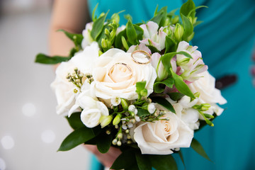 Bride holding her bouquet, closeup