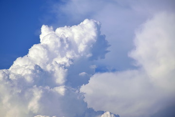 White clounds on blue sky background,use for backdrop or web design,soft focus.