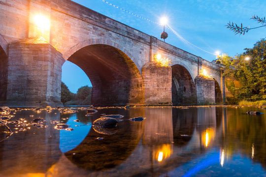 An Old Stone Bridge At Night In Wetherby, North Yorkshire