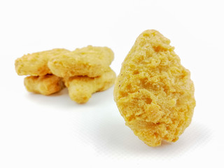 chicken nuggets on a white background