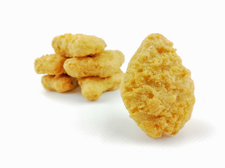 chicken nuggets on a white background