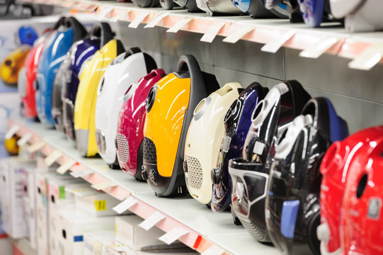 Vacuum Cleaners In Appliance Store Arranged In A Row