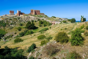 Hammershus castle - the biggest Northern Europe castle ruins situated at steep granite cliff on the...