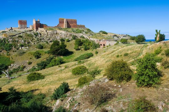 Hammershus castle - the biggest Northern Europe castle ruins situated at steep granite cliff on the Baltic Sea coast, Bornholm, Denmark