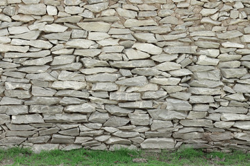 Stone wall background, gray rock texture in natural pattern with high resolution for design art work.