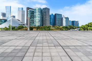 Blue sky, empty marble floor and skyline of Hangzhou urban architecture.