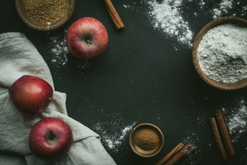 Backing background with ingredients for baking apple pie and kitchen tools