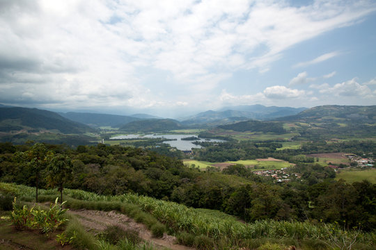 View over the beautiful Costa Rican valley of Turrialba and the Angostura Lagoon near the active volcano with same name. 
