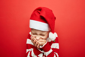 Kind prustet vor Lachen los zu Weihnachten - obrazy, fototapety, plakaty