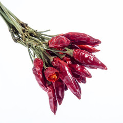 Dried Hot Red Small Peppers with stem in bouquet. Isolated in white background.