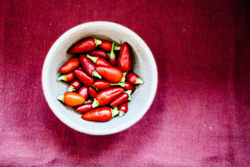 chillies in wooden container taken close up