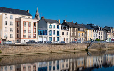 Reflections in the sarthe river at Le Mans, France.