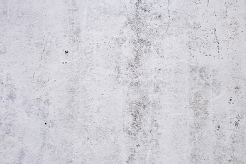 brick plastered wall with whitewash with potholes, cracks and stains, shot on a cloudy autumn day