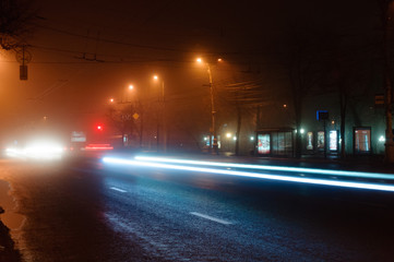 The light trails it the fog at night