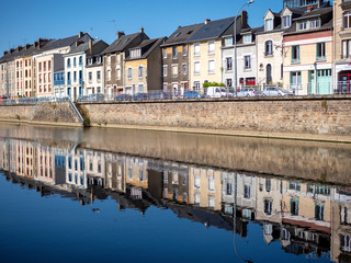 Reflections in the sarthe river at Le Mans, France. - obrazy, fototapety, plakaty