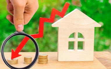 a decline in property prices. concept of depopulation. falling interest on the mortgage. reduction...
