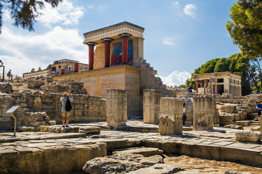 Palace in Knossos with red columns. Knossos palace on the island of Crete in Greece. Ancient ruins of the burning part of the Archaeological Museum in Heraklion.