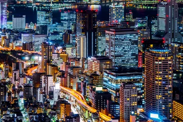 Foto op Plexiglas Tokyo toren en skyline van de stad onder de blauwe nacht © voyata