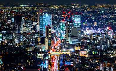 tokyo tower and city skyline under blue night