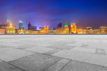 Blue sky, empty marble floor and skyline of Shanghai urban architecture.