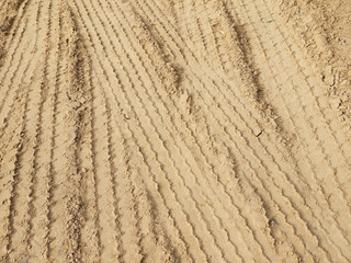 Fototapeta na wymiar Wheel track on sand